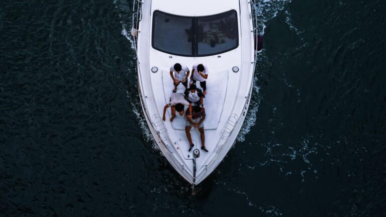 Yacht crew on stern
