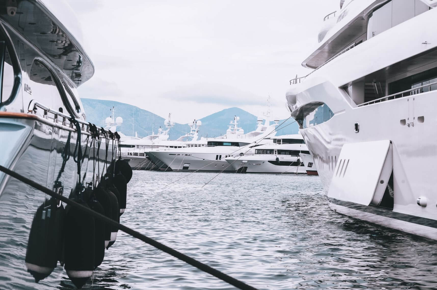 many superyachts in port